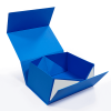Open blue folding gift box showing interior design