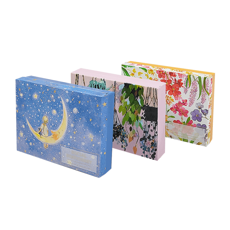 Book Style Box blue starry design with gold moon and jewelry inside