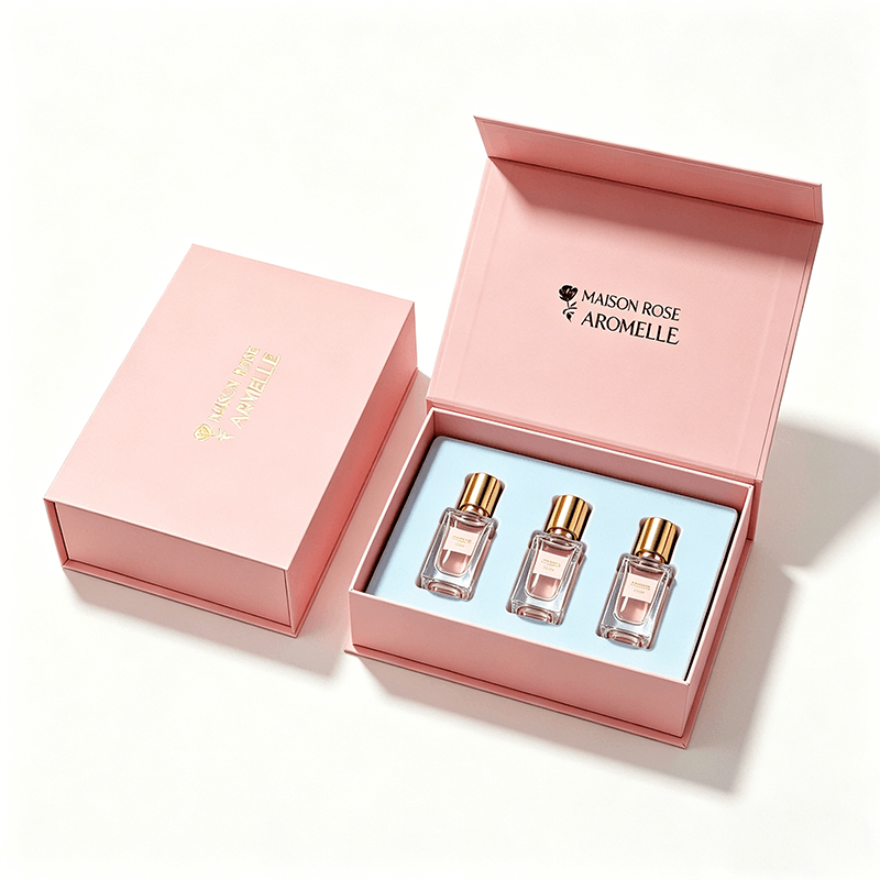 Pink custom perfume gift box with three bottles in a fitted insert